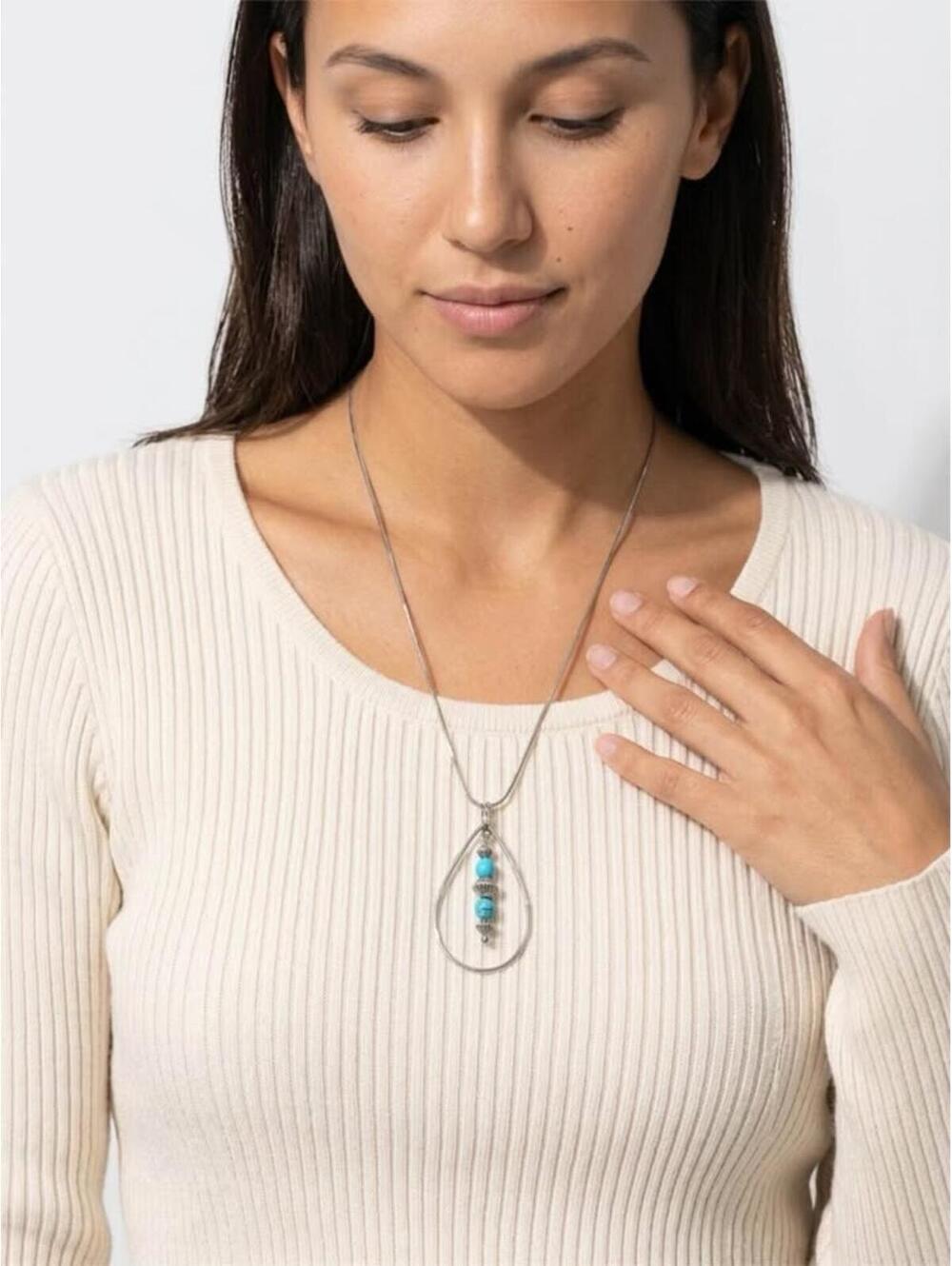 Silver tone necklace with turquoise beads